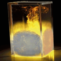 a glass box containing fire