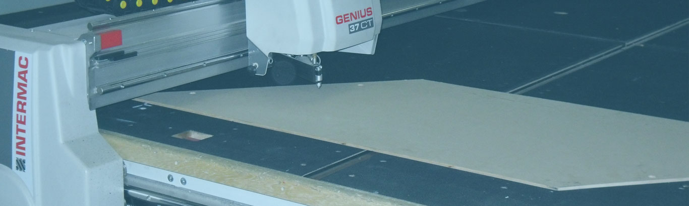 a photo of a wooden template being scanned in to a CAD format