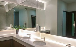 mirrors installed on to a cupboard in a bathroom